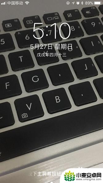 手机相册怎么设置桌面主题 iPhone手机照片如何快速设置成桌面壁纸教程